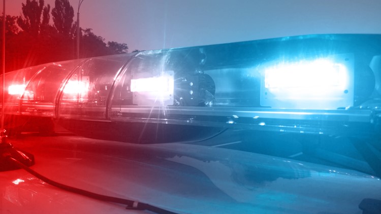 Emergency responders at the scene of a vehicle accident in a residential neighborhood
